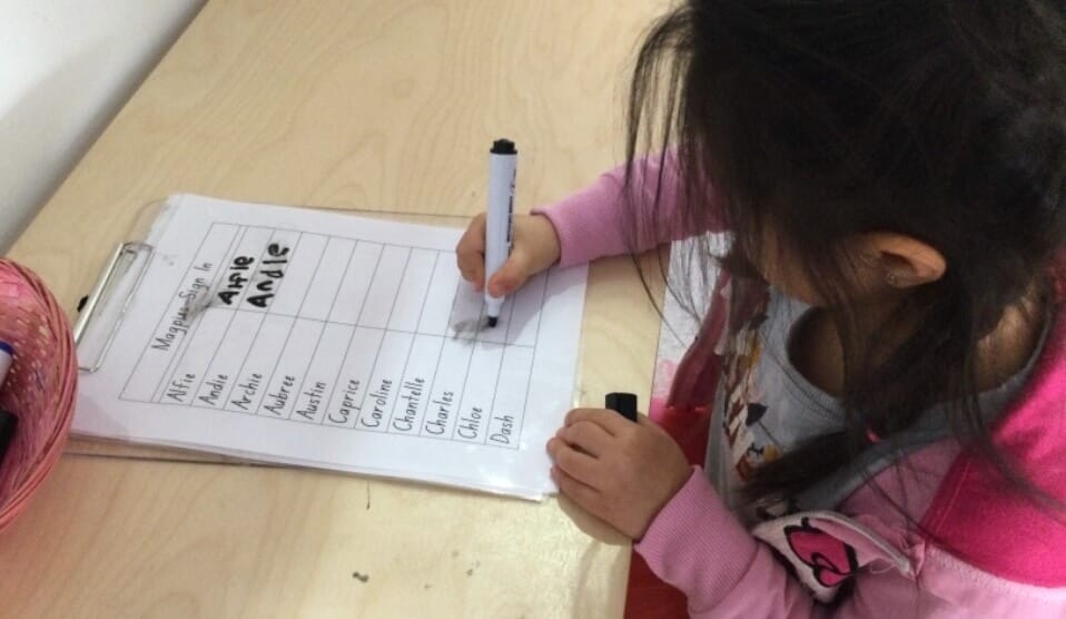 A Child at SEEC begins to learn to recognise and write their name.